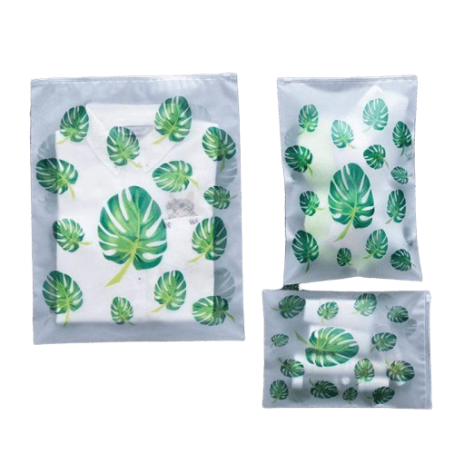 Trousse de toilette transparente motif feuilles