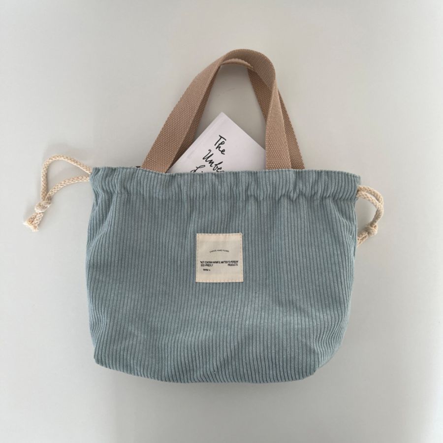 Trousse de toilette en velours côtelé