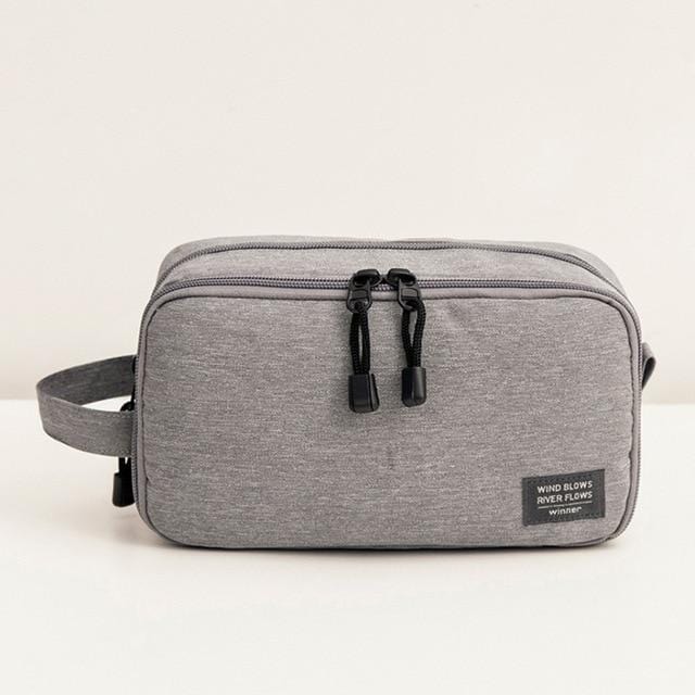 Trousse de toilette homme avec compartiment en voyage