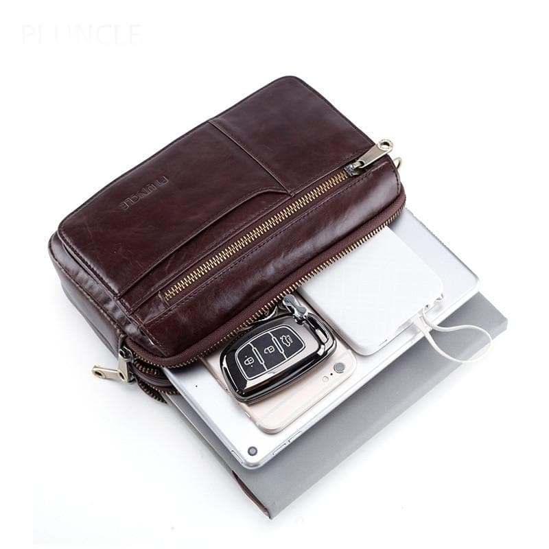 Trousse de toilette en cuir avec lanière marron
