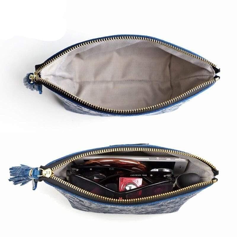 Sac de toilette en cuir avec motifs décoratifs