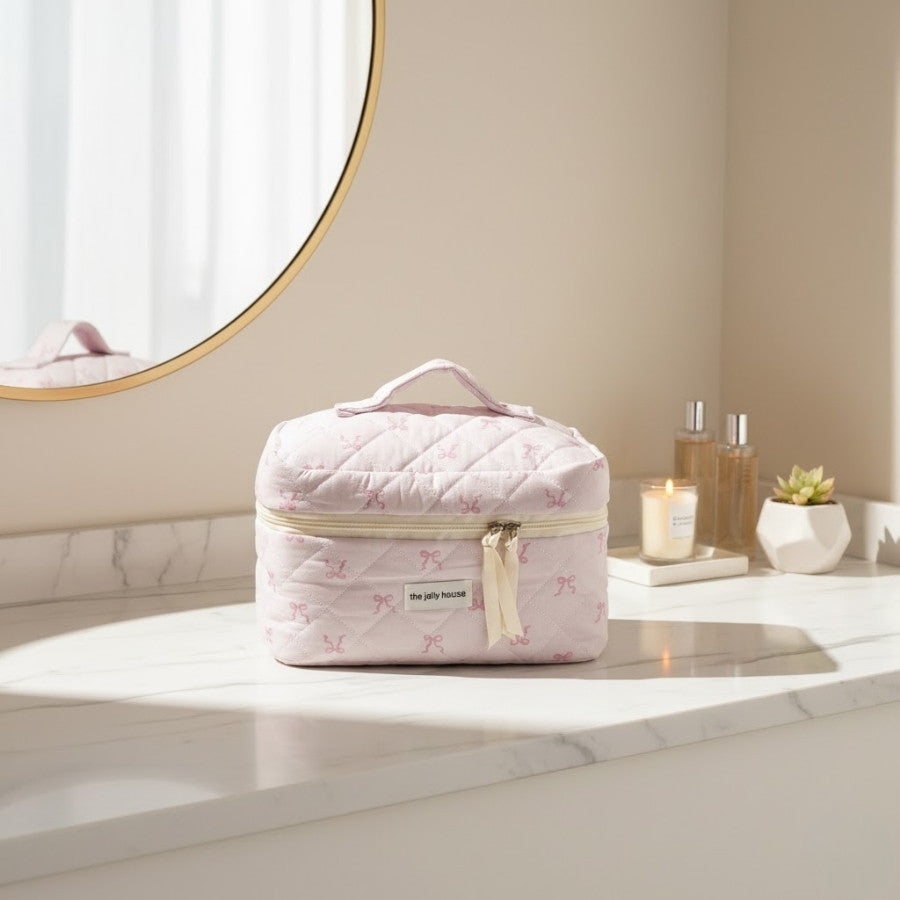 trousse de toilette élégante motifs nœuds roses