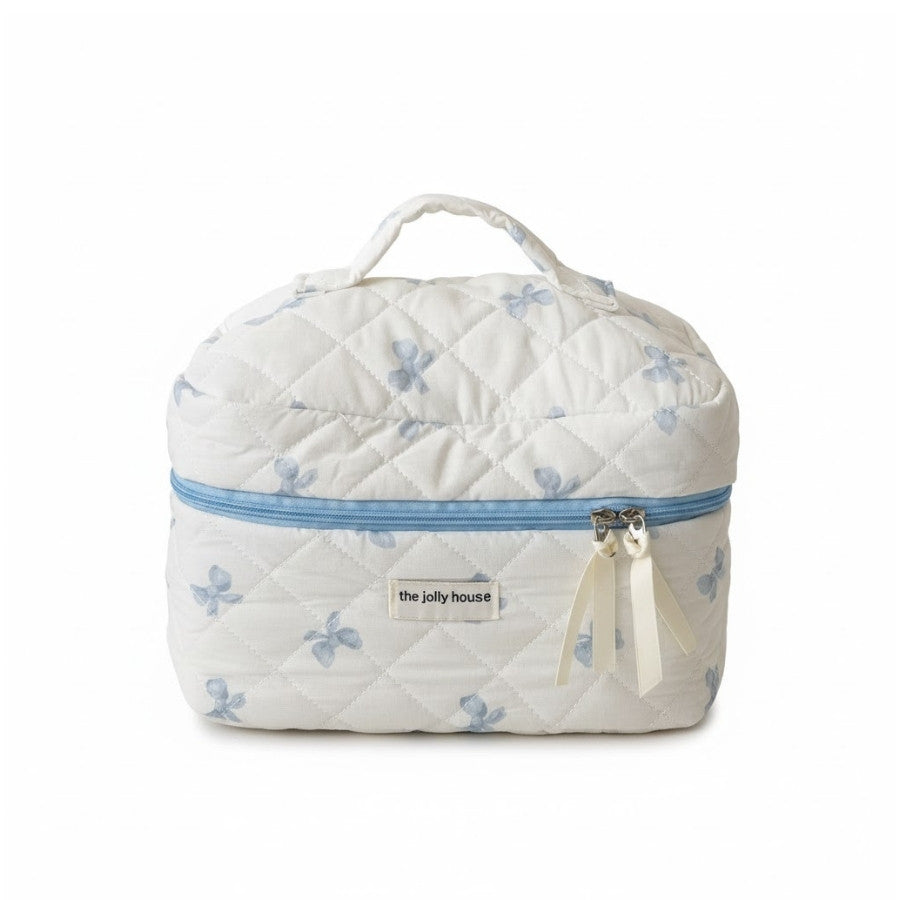 rangement beauté tissu matelassé motifs nœuds papillon